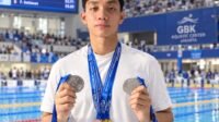 Didi June Elbert, perenang Millennium Aquatic Jakarta sekaligus siswa SMA Muhammadiyah 3 Jakarta, meraih tiga medali emas nomor gaya dada pada KRAPDA DKI Jakarta 2026 di Stadion Akuatik GBK, Senayan, Jakarta.